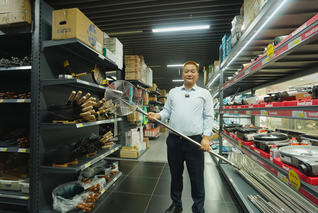 COPINA team member in commercial kitchen equipment showroom